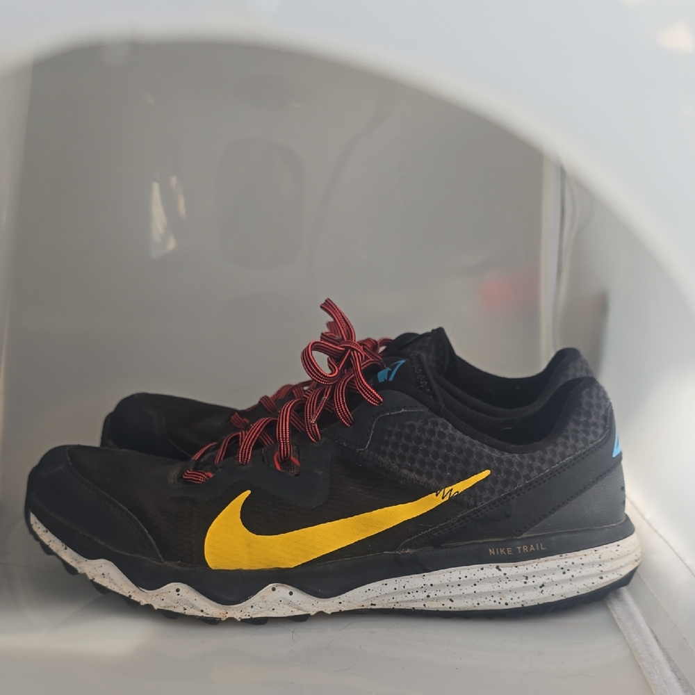 Nike Black Trail Shoes with Yellow and Red Accents